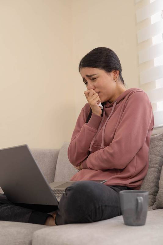 woman with a peaceful expression under warm light. Ideal for themes of mindfulness, authenticity, sad moment