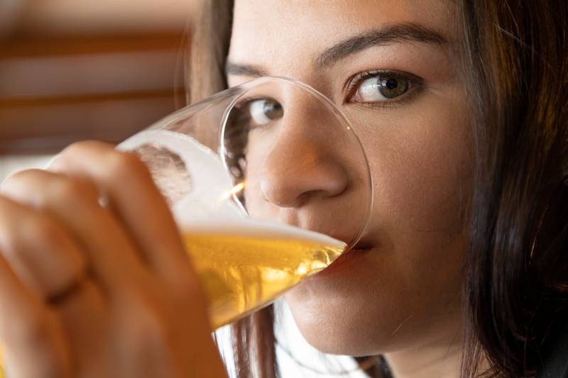 glass with beer, closeup to details, studio and drinks