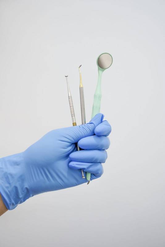 dental instruments including mirror, modern object for health, studio