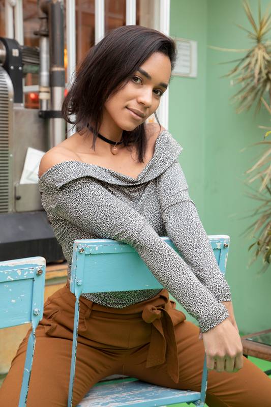 sitting on a celestial chair, wearing casual clothes