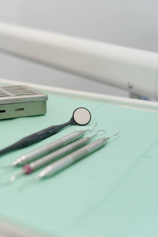 professional dental instruments, arranged on the work table in an orderly manner