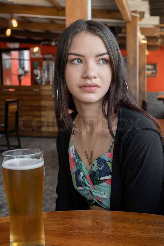 woman with straight and straight hair, she is smiling and wearing hoop earrings, beauty