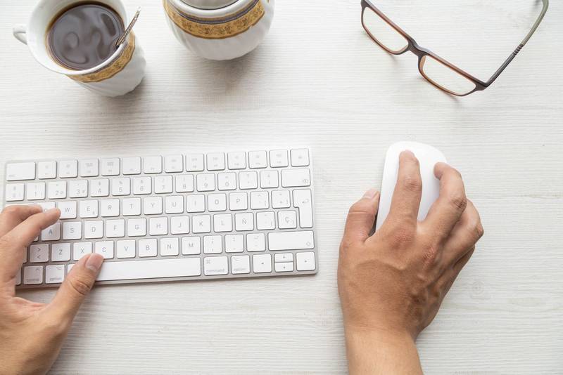 cup of coffee and jar of sugar on the desk, lifestyle at work