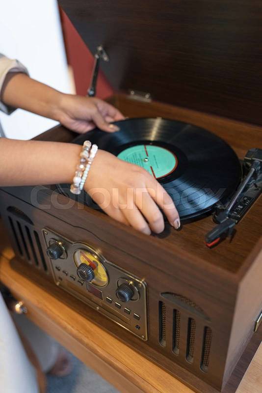 music on a turntable with vintage design, player with acetate disc