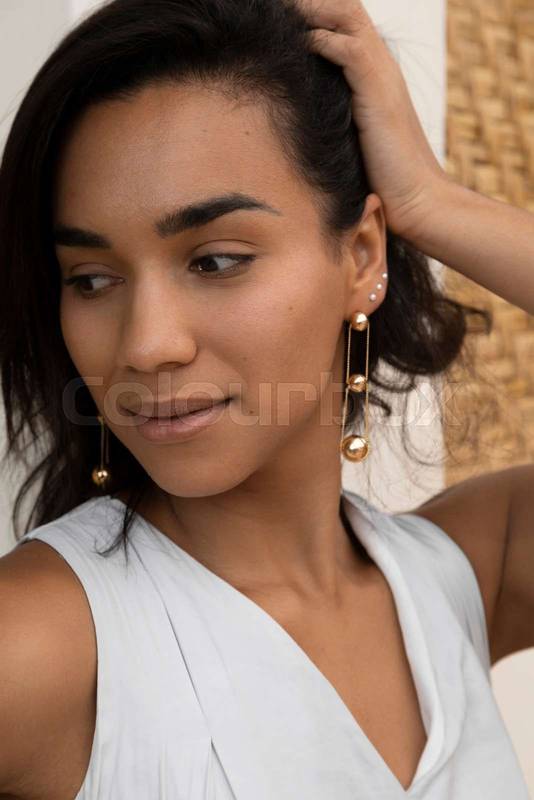 natural beauty, profile of the face of a young Latin brunette woman