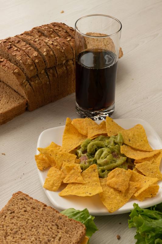 crunchy nachos accompanied by guacamoles, sandwich with cheese, ingredients